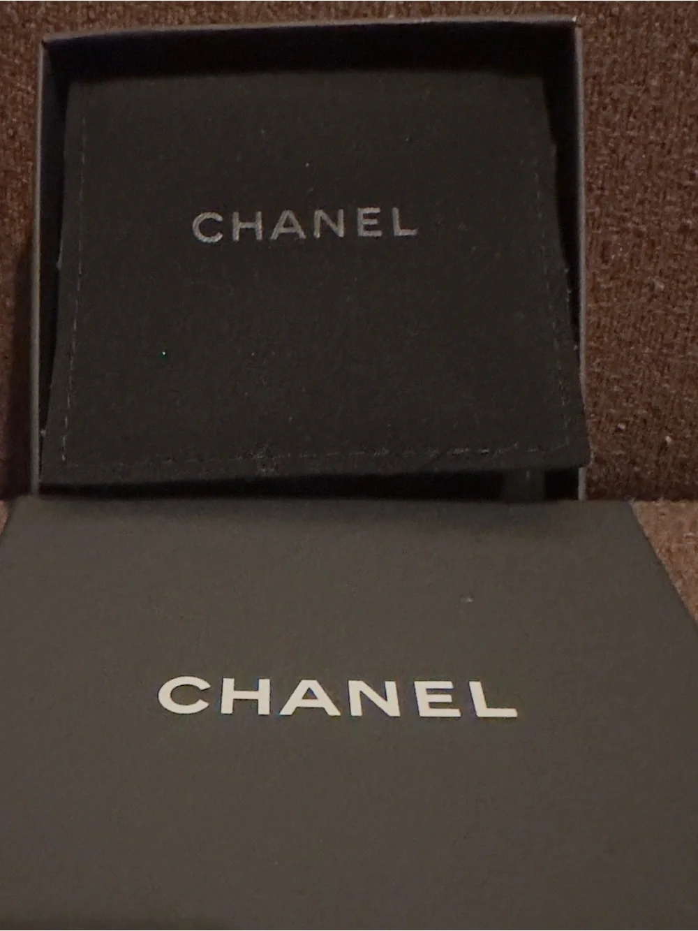 LIKE NEW CHANEL Gold and Black Interlocking CC Logo Brooch. 19S Collection.